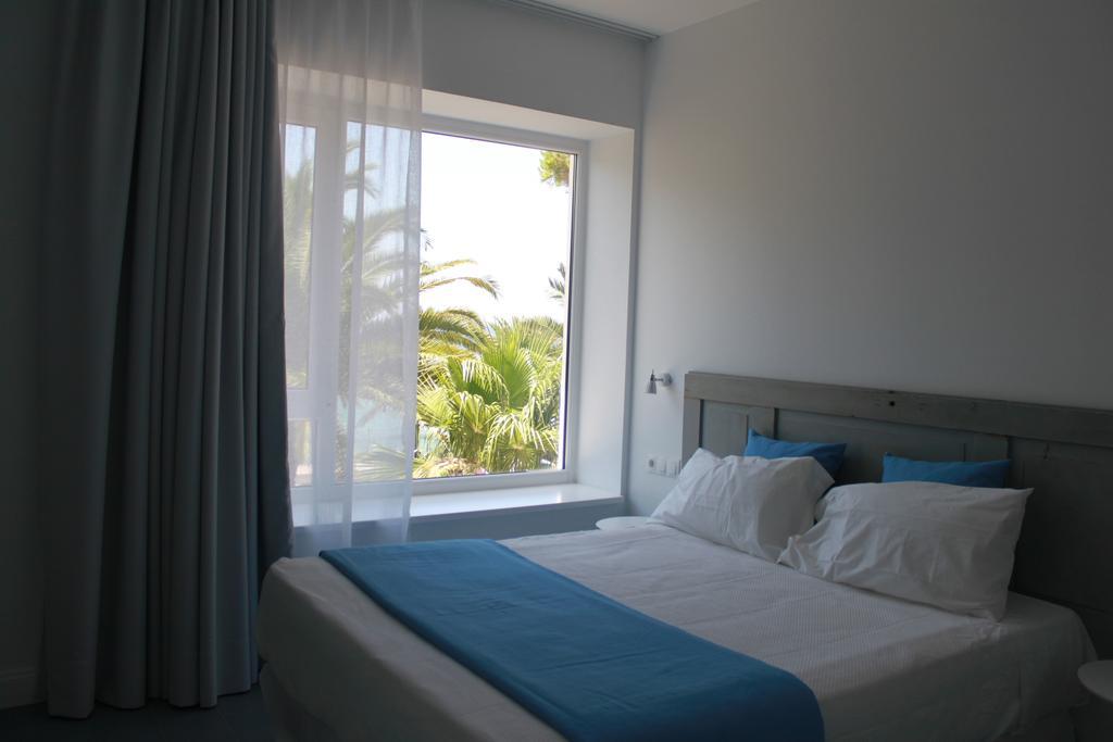 Guadalupe Hotel Boutique Лос-Каньос-де-Мека Номер фото